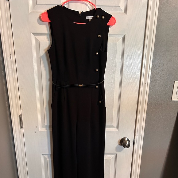 Calvin Klein Pants - Calvin Klein jumpsuit with gold buttons. Size 4.